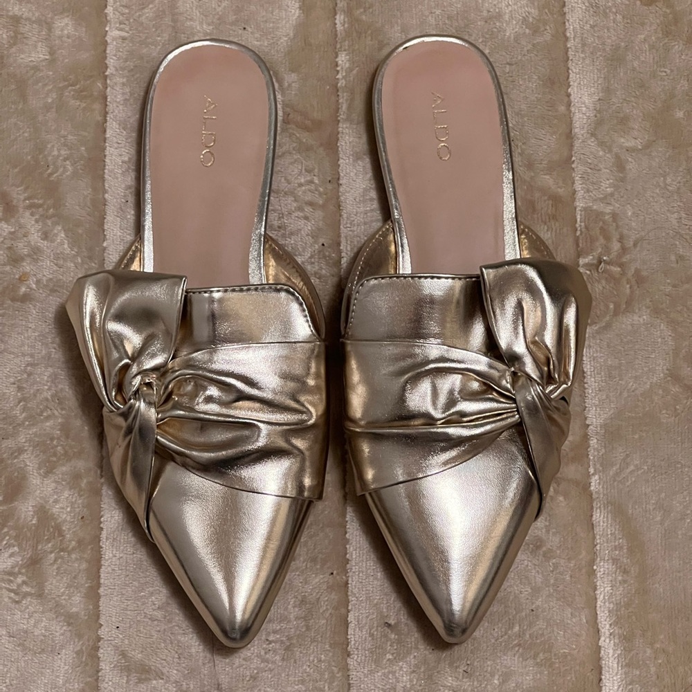 ALDO pointy slip on gold flats